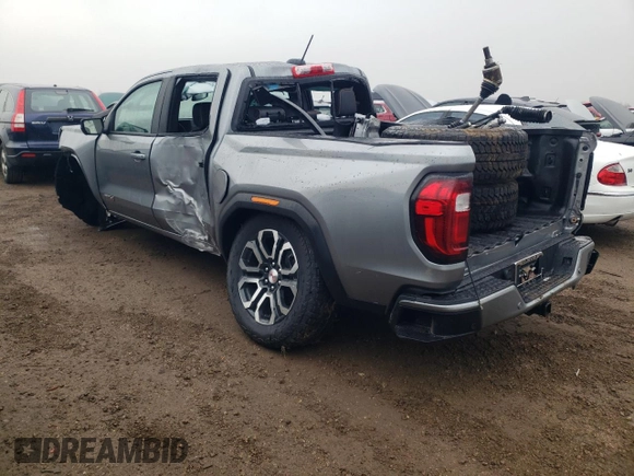2024 GMC Canyon 4WD AT4 z VIN 1GTP6DEK8R1306627, wystawiony jako Copart lot #80921614 z przebiegiem 6 mil mil oraz Szkoda całkowita • Salvage title. Historia ofert i sprzedaży dostępna na DreamBid. Obrazek 2.