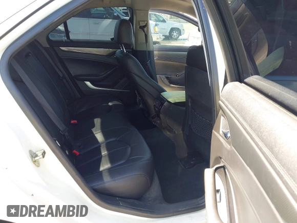 2010 Cadillac CTS with VIN 1G6DA5EG7A0135451, listed as a IAAI auction lot 41964313 with 136,172 mi miles and . Bid and sale history available at DreamBid. Image 8.