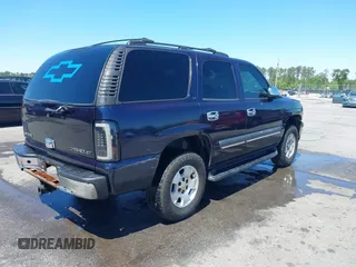 2004 Chevrolet Tahoe LT with VIN 1GNEC13Z44J125913, listed as a IAAI auction lot 42027889 with 205,796 mi miles. Bid and sale history available at carsss.com. Image 4.