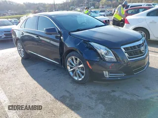 2013 Cadillac XTS Premium with VIN 2G61T5S32D9237829, listed as a IAAI auction lot 41863539 with 149,661 mi miles. Bid and sale history available at carsss.com. Image 1.