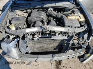 2009 Chrysler 300 LX with VIN 2C3KA43D79H554807, listed as a Copart auction lot 46872625 with 139,843 mi miles and Salvage Title. Bid and sale history available at carsss.com. Image 11.