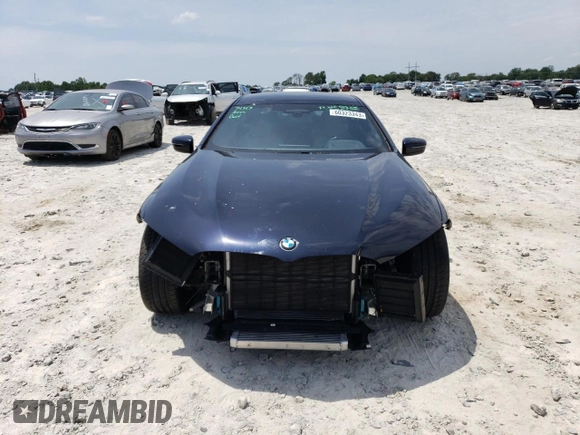 2022 BMW 8 Series M850i with VIN WBAGV8C07NCJ85581, listed as a Copart auction lot 60323343 with 11,169 mi miles. Bid and sale history available at carsss.com. Image 5.
