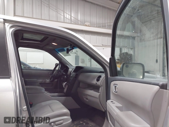 2011 Honda Pilot EX-L with VIN 5FNYF4H66BB029802, listed as a IAAI auction lot 42101545 with 240,127 mi miles and . Bid and sale history available at carsss.com. Image 5.