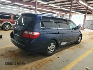 2005 Honda Odyssey EX-L with VIN 5FNRL38785B054186, listed as a Copart auction lot 58072125 with 219,928 mi miles and Salvage title. Bid and sale history available at DreamBid. Image 3.
