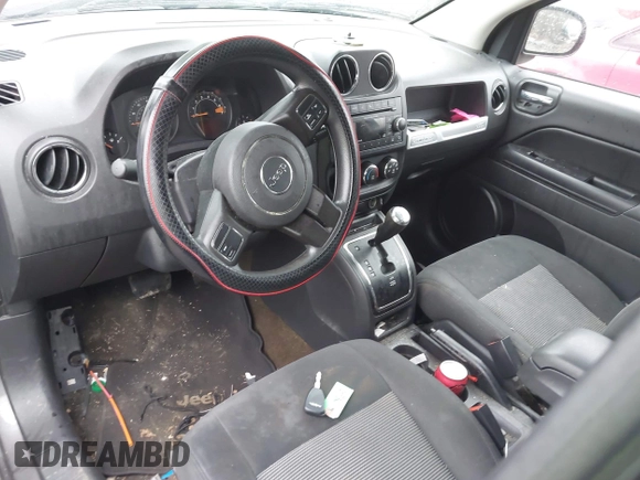 2016 Jeep Compass Sport with VIN 1C4NJDBB1GD632341, listed as a IAAI auction lot 42043710 with 80,137 mi miles and . Bid and sale history available at DreamBid. Image 5.