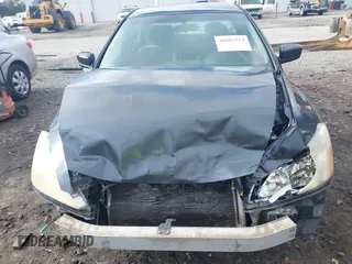 2005 Honda Accord LX z VIN 1HGCM56425A148498, wystawiony jako IAAI lot #40883324 z przebiegiem 245 802 mil mil oraz . Historia ofert i sprzedaży dostępna na DreamBid. Obrazek 12.