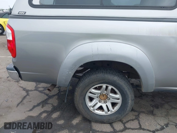 2005 Toyota Tundra SR5 with VIN 5TBDT441X5S479169, listed as a IAAI auction lot 42058790 with 323,936 mi miles and . Bid and sale history available at DreamBid. Image 19.