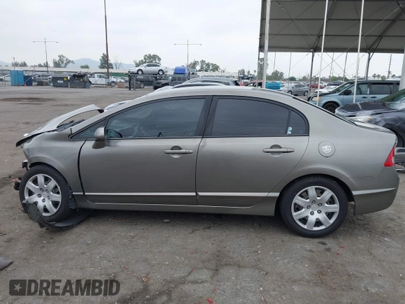 2006 Honda Civic LX with VIN 2HGFA16586H507296, listed as a IAAI auction lot 42101001 with 144,781 mi miles and . Bid and sale history available at DreamBid. Image 15.