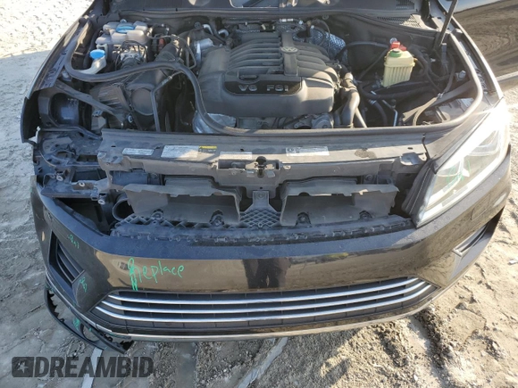2016 Volkswagen Touareg Sport with VIN WVGEF9BP7GD010767, listed as a Copart auction lot 44782585 with 125,970 mi miles and Salvage Title. Bid and sale history available at DreamBid. Image 12.