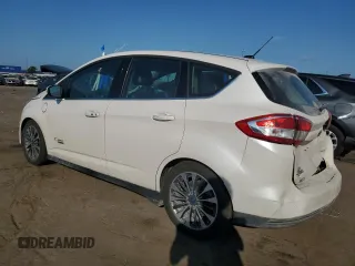 2017 Ford C-Max Energi Titanium with VIN 1FADP5FU9HL107830, listed as a Copart auction lot 71574254 with 61,626 mi miles and Clean Title. Bid and sale history available at carsss.com. Image 2.