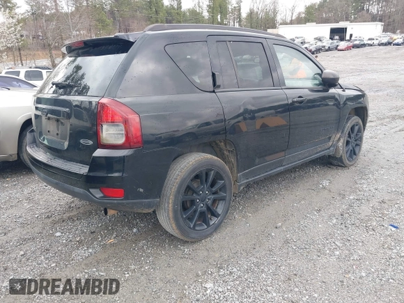 2014 Jeep Compass Sport with VIN 1C4NJCBA9ED823228, listed as a IAAI auction lot 41714992 with 168,996 mi miles. Bid and sale history available at carsss.com. Image 4.