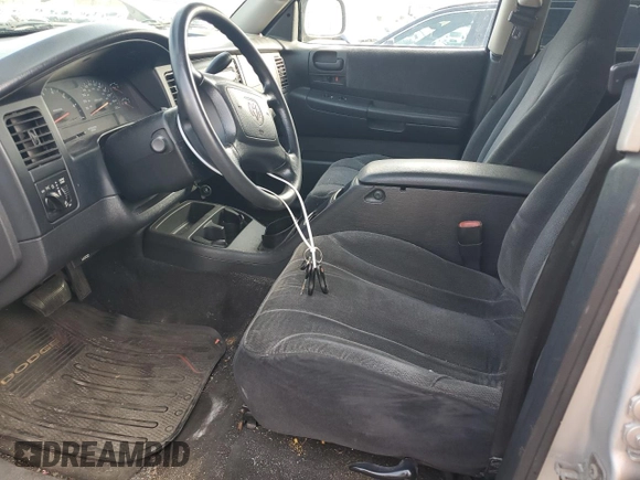 2004 Dodge Dakota SLT with VIN 1D7HG48NX4S677465, listed as a Copart auction lot 51044735 with 196,854 mi miles and Clean title. Bid and sale history available at DreamBid. Image 7.