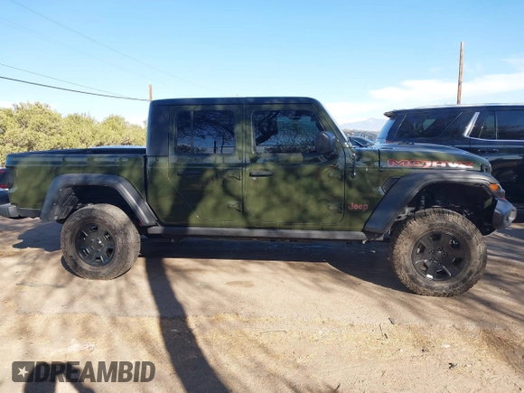 2021 Jeep Gladiator Mojave with VIN 1C6JJTEG8ML606876, listed as a IAAI auction lot 41632052 with 30,255 mi miles and . Bid and sale history available at DreamBid. Image 13.