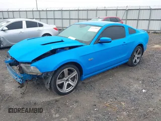 2013 Ford Mustang GT with VIN 1ZVBP8CF4D5268218, listed as a IAAI auction lot 41555868 with 219,385 mi miles. Bid and sale history available at carsss.com. Image 17.