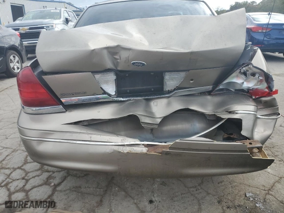 2005 Ford Crown Victoria LX with VIN 2FAFP74W95X147431, listed as a Copart auction lot 73487374 with 203,107 mi miles and Non Repairable. Bid and sale history available at carsss.com. Image 6.