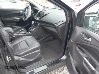 2014 Ford Escape Titanium with VIN 1FMCU9J95EUD60587, listed as a IAAI auction lot 42129854 with 155,559 mi miles and . Bid and sale history available at DreamBid. Image 5.