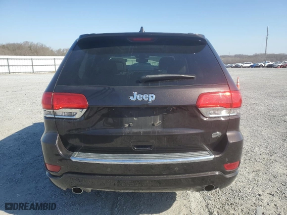 2017 Jeep Grand Cherokee Overland with VIN 1C4RJECG2HC712823, listed as a Copart auction lot 48063325 with 124,812 mi miles and Salvage Title. Bid and sale history available at carsss.com. Image 6.