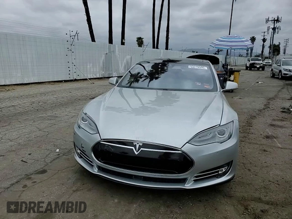 2015 Tesla Model S 85D with VIN 5YJSA1H28FFP78686, listed as a Copart auction lot 53310595 with 69,682 mi miles and Salvage Title. Bid and sale history available at carsss.com. Image 10.