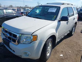 2011 Ford Escape XLT with VIN 1FMCU0D77BKB45161, listed as a IAAI auction lot 41890058 with 263,786 mi miles. Bid and sale history available at carsss.com. Image 18.