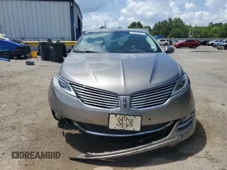 2016 Lincoln MKZ z VIN 3LN6L2J96GR601039, wystawiony jako Copart lot #63209425 z przebiegiem 151 629 mil mil oraz Szkoda całkowita • Salvage title. Historia ofert i sprzedaży dostępna na DreamBid. Obrazek 5.