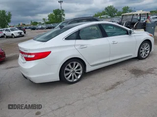2016 Hyundai Azera Limited z VIN KMHFH4JG6GA547389, wystawiony jako IAAI lot #42374403 z przebiegiem 164 843 mil mil oraz . Historia ofert i sprzedaży dostępna na DreamBid. Obrazek 4.