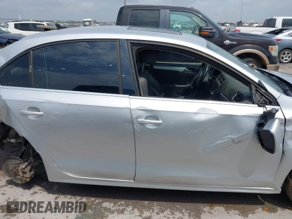 2012 Volkswagen Jetta TDI w/Premium & Nav with VIN 3VWLL7AJXCM359181, listed as a IAAI auction lot 42110771 with 148,547 mi miles and . Bid and sale history available at DreamBid. Image 14.