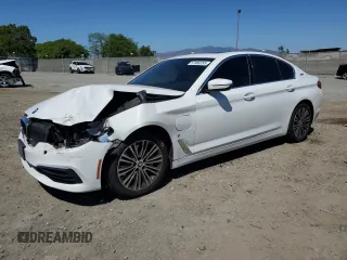 2019 BMW 5 Series 530e with VIN WBAJA9C5XKB253974, listed as a Copart auction lot 57880255 with Not provided miles and Salvage title. Bid and sale history available at DreamBid. Image 1.