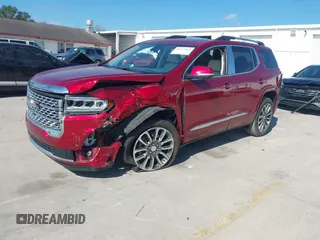2021 GMC Acadia Denali with VIN 1GKKNPLS0MZ217134, listed as a IAAI auction lot 41475069 with 47,130 mi miles and . Bid and sale history available at carsss.com. Image 18.