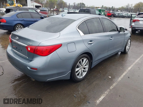2015 Infiniti Q50 Premium with VIN JN1BV7AR4FM393974, listed as a IAAI auction lot 41874345 with 148,228 mi miles. Bid and sale history available at carsss.com. Image 4.