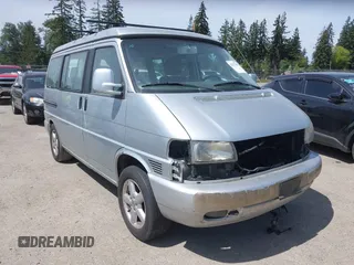 2003 Volkswagen EuroVan MV with VIN WV2NB47003H003131, listed as a IAAI auction lot 42157821 with 166,159 mi miles and . Bid and sale history available at DreamBid. Image 1.