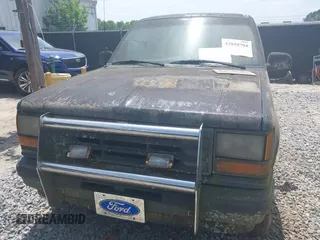 1991 Ford Explorer z VIN 1FMCU24X3MUA54214, wystawiony jako IAAI lot #42010794 z przebiegiem 55 239 mil mil oraz . Historia ofert i sprzedaży dostępna na DreamBid. Obrazek 10.