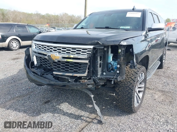 2019 Chevrolet Suburban LT with VIN 1GNSCHKC2KR408575, listed as a IAAI auction lot 42060103 with 144,838 mi miles and . Bid and sale history available at DreamBid. Image 6.