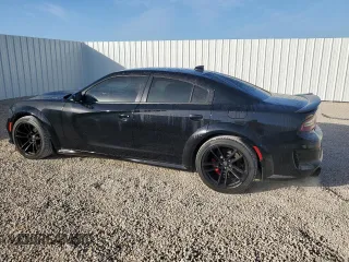 2021 Dodge Charger Scat Pack Widebody with VIN 2C3CDXGJ5MH637464, listed as a Copart auction lot 85671524 with 101,343 mi miles and Salvage Title. Bid and sale history available at carsss.com. Image 2.