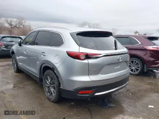 2021 Mazda CX-9 Touring with VIN JM3TCBCY2M0507027, listed as a IAAI auction lot 41079723 with 61,387 mi miles. Bid and sale history available at carsss.com. Image 3.