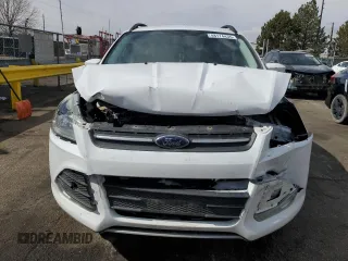 2016 Ford Escape SE с VIN 1FMCU9G90GUB99219, выставлен на аукционе Copart как лот 48174435 с пробегом 116 303 миль миль и Списание • Salvage title. История ставок и продаж доступна на DreamBid. Изображение 5.