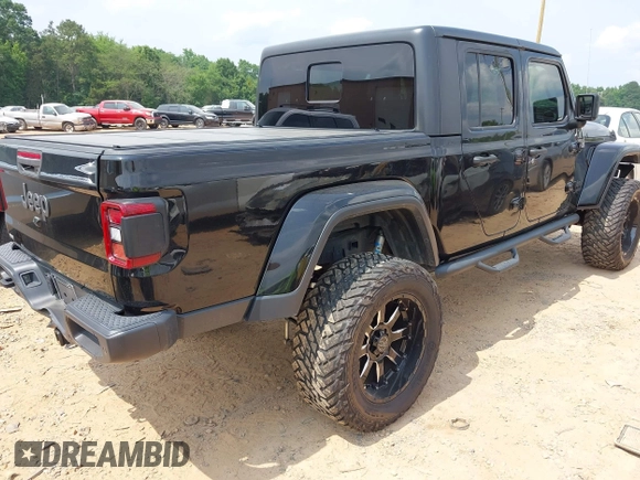 2021 Jeep Gladiator Willys with VIN 1C6HJTAG7ML514114, listed as a IAAI auction lot 42399793 with 78,829 mi miles and . Bid and sale history available at DreamBid. Image 4.