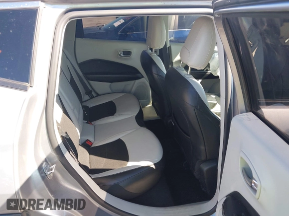 2019 Jeep Compass Altitude with VIN 3C4NJCBB1KT819754, listed as a IAAI auction lot 42083019 with 79,949 mi miles and . Bid and sale history available at DreamBid. Image 8.