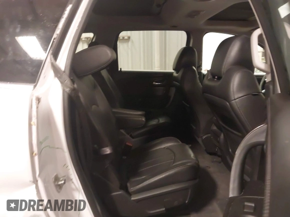 2017 Chevrolet Traverse Premier with VIN 1GNKVJKD9HJ340891, listed as a IAAI auction lot 41601595 with 96,647 mi miles and . Bid and sale history available at DreamBid. Image 8.