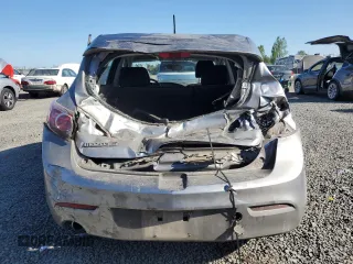 2013 Mazda 3 i Touring z VIN JM1BL1LP7D1841036, wystawiony jako Copart lot #53365045 z przebiegiem 166 539 mil mil oraz Szkoda całkowita • Salvage title. Historia ofert i sprzedaży dostępna na DreamBid. Obrazek 6.