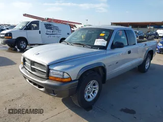 2002 Dodge Dakota with VIN 1B7GL12X62S538389, listed as a IAAI auction lot 41533809 with 159,576 mi miles and . Bid and sale history available at carsss.com. Image 2.