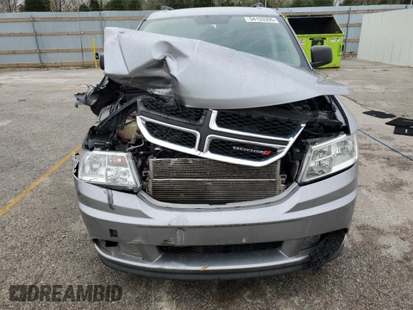 2017 Dodge Journey SE z VIN 3C4PDCAB2HT601316, wystawiony jako Copart lot #54153395 z przebiegiem 138 737 mil mil oraz Szkoda całkowita • Salvage title. Historia ofert i sprzedaży dostępna na DreamBid. Obrazek 5.