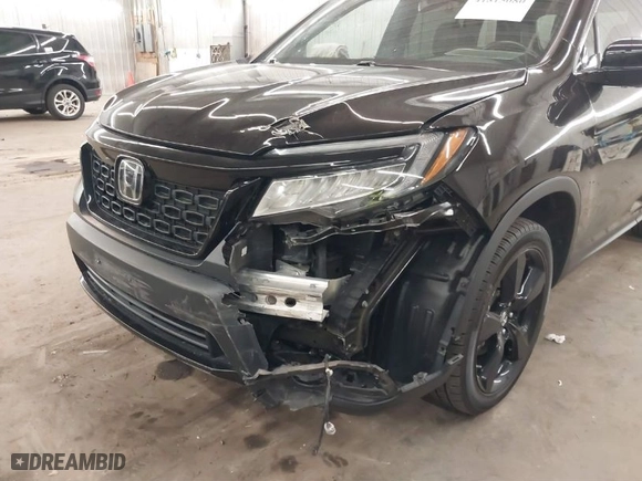 2020 Honda Passport Elite with VIN 5FNYF8H02LB010085, listed as a IAAI auction lot 41815080 with 79,343 mi miles. Bid and sale history available at carsss.com. Image 6.