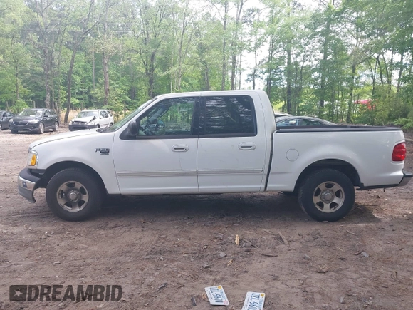 2003 Ford F-150 XLT with VIN 1FTRW07663KD69809, listed as a IAAI auction lot 42198549 with 166,466 mi miles and . Bid and sale history available at DreamBid. Image 14.
