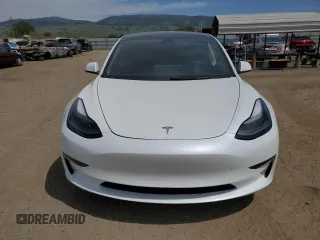 2023 Tesla Model 3 с VIN 5YJ3E1EA7PF452786, выставлен на аукционе Copart как лот 52570005 с пробегом 61 492 миль миль и Списание • Salvage title. История ставок и продаж доступна на DreamBid. Изображение 5.