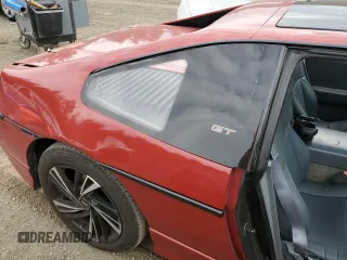 1987 Pontiac Fiero GT z VIN 1G2PG1199HP214795, wystawiony jako Copart lot #75901054 z przebiegiem 206 675 mil mil oraz Szkody całkowita. Historia ofert i sprzedaży dostępna na DreamBid. Obrazek 10.