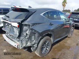 2022 Lexus NX with VIN 2T2AGCEZ7NC011773, listed as a IAAI auction lot 41502665 with 14,096 mi miles. Bid and sale history available at carsss.com. Image 4.