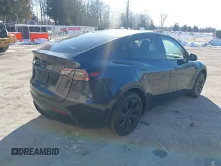 2025 Tesla Model Y Long Range with VIN 7SAYGDED0SF256230, listed as a IAAI auction lot 41356520 with 262 mi miles and . Bid and sale history available at DreamBid. Image 4.