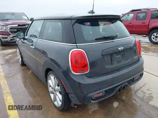 2014 MINI Hardtop S with VIN WMWXM7C56ET926604, listed as a IAAI auction lot 41642560 with 81,219 mi miles and . Bid and sale history available at DreamBid. Image 3.
