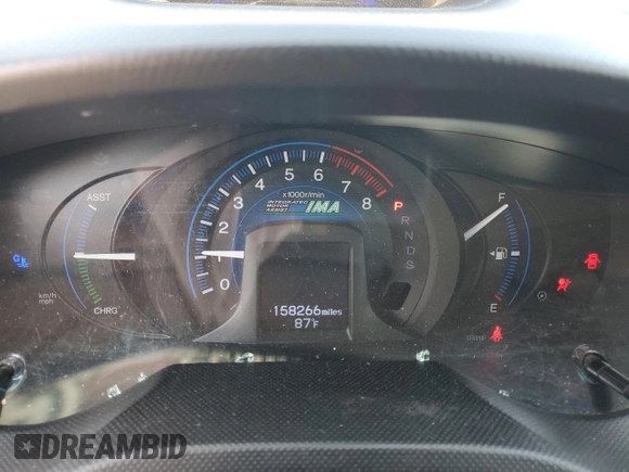 2012 Honda Insight EX z VIN JHMZE2H77CS002907, wystawiony jako Copart lot #52040465 z przebiegiem 158 266 mil mil oraz Szkoda całkowita • Salvage title. Historia ofert i sprzedaży dostępna na DreamBid. Obrazek 9.