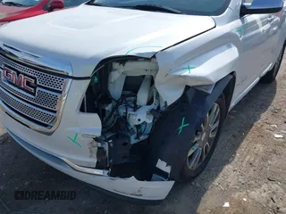2017 GMC Terrain Denali z VIN 2GKFLRE32H6166259, wystawiony jako IAAI lot #41585603 z przebiegiem 95 508 mil mil oraz . Historia ofert i sprzedaży dostępna na DreamBid. Obrazek 6.